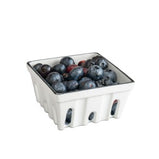 White porcelain berry basket. A beautiful and aesthetic way to wash and store any number of different small fruits.
