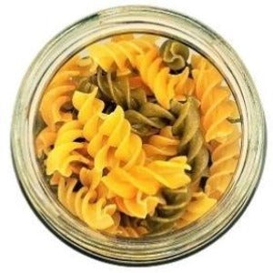 Vegetable Spirals Brown Rice Pasta in a jar with a white background