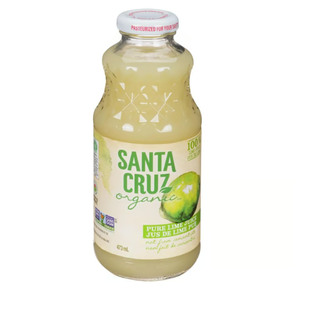 Santa cruz lime juice in a glass bottle on a white background