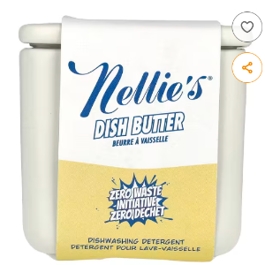 A white ceramic square dish with a Nellies Dish butter label