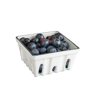 White porcelain berry basket. A beautiful and aesthetic way to wash and store any number of different small fruits.