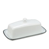 White porcelain butter dish to help keep your butter fresher for longer at room temperature. Keeps light and air away from the butter so you can keep it both spreadable and fresh. 8"L x 4.5"W x 3.75"H