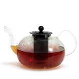Glass teapot with metal infuser and lid for loose leaf tea.