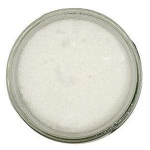 Erythritol in a jar with a white background
