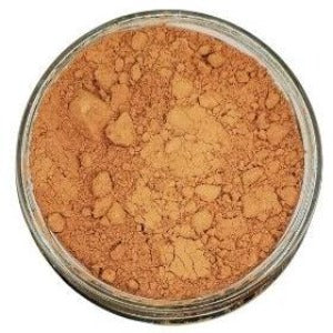 Organic Cocoa Powder in a jar with a white background