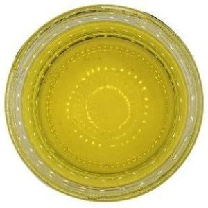 White background with a glass jar filled with Organic Canola Oil.