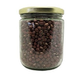 White background with a clear, glass jar filled with dry organic Adzuki Beans sealed with a metal lid.
