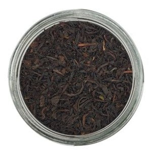 English Breakfast Black Tea organic in a jar with a white background (top view)