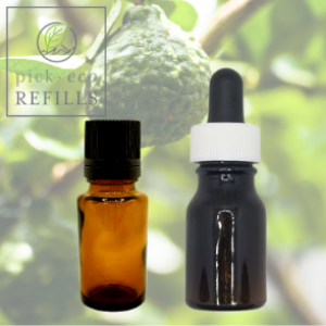 Two Essential oil bottles are in front of a picture of a Bergamot tree.