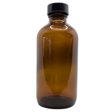 A sleek, transparent bottle holds Jojoba Oil Clear Refined, radiating a golden hue under soft light. The oil, pristine and pure, appears lightweight and translucent, exuding a subtle, natural glow. Its refined clarity showcases a smooth texture, promising versatility and purity. As it catches the light, the oil embodies a sense of purity and luxury, inviting you to experience its nourishing and revitalizing properties.