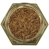 White background with a glass jar filled with Whole Caraway Seeds.